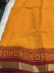 Vibrant Orange Saree with Maroon Border