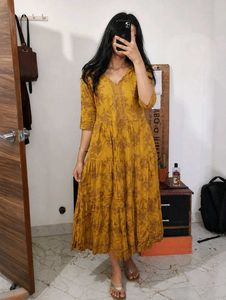 A mustard yellow anarkali kurta