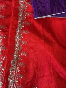 Red Saree with Purple Blouse