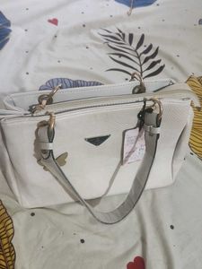 brand new White Handbag with Charm