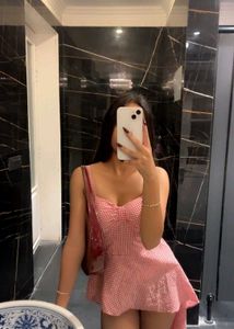 Chic Pink Gingham Peplum Dress