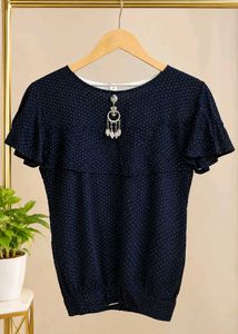 Stylish Navy Polka Dot Top with Charm