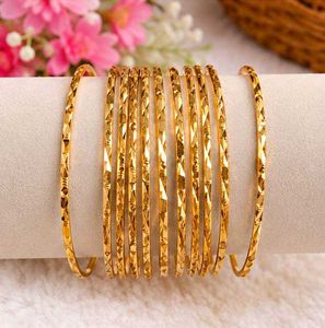 Set of 12 Elegant Gold Bangles