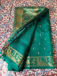 Beautiful Teal Saree with Gold Border