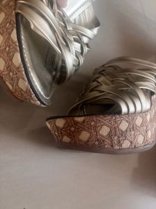 stock clearance catwalk gold wedges