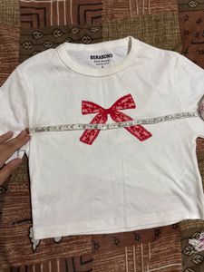 White T-Shirt with Red Bow Detail