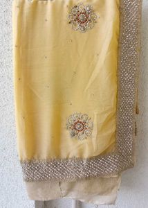 creame embellished saree with matching blouse