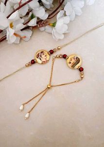 Elegant Hand-Painted Portrait couple rakhi.....
