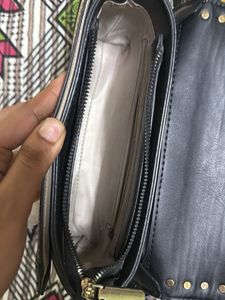 Signature Canvas sling Bag