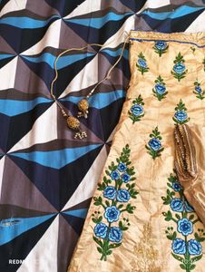 Beige Lehenga Choli with Blue Floral Embroidery