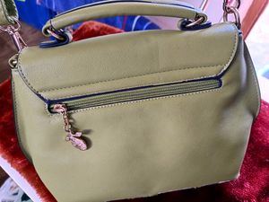Stylish Green Hand Bag.     Lil Ripped From Its Bottom
