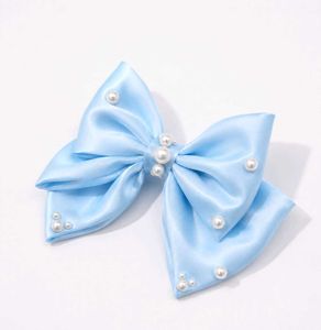 Elegant Pearl Embellished Bow Hair Clip