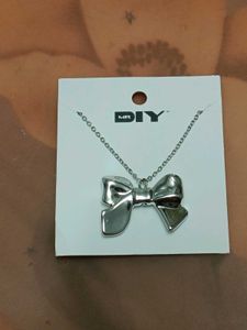 Silver Bow Pendant Necklace