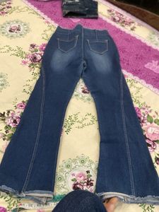 Blue Flared Jeans with Orange Crop Top