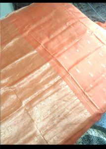 Vibrant Orange Saree with Golden Border