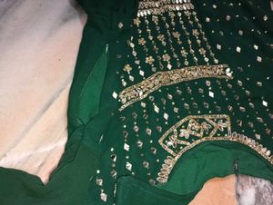 dark green kurti with lehga
