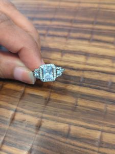 Elegant Emerald Cut Halo Ring