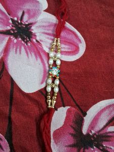 Elegant Rakhi with Pearls and Crystals set of 6 pc
