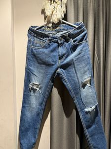 Ripped Blue Denim Jeans