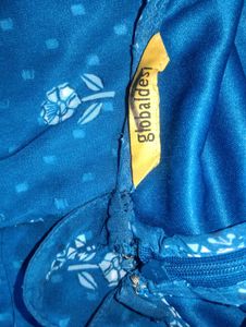 blue sleeveless halterneck jumpsuit