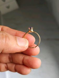 Elegant Gold Ring with Purple Stone