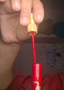 it is maroon and deep red shringar bindi stick