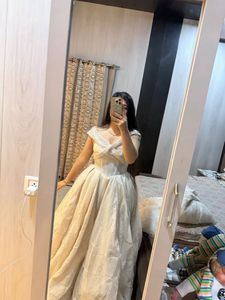 beautiful golden party gown with trail🎀🧚🏻‍♀️