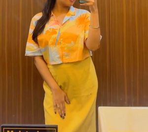 Vibrant Cropped Button-Up Shirt and skirt