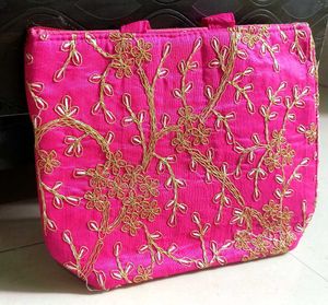 Vibrant Pink Embroidered Handbag