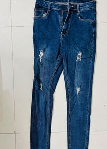 Ripped Blue Denim Jeans