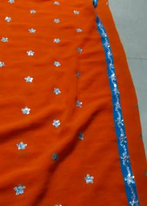 Orange Saree with Star Motifs and Blouse