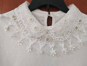 Elegant White Embellished Blouse
