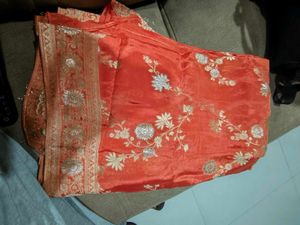 Vibrant Orange Embroidered Saree