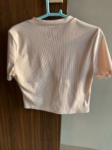 Crop top with corset kind design in front
