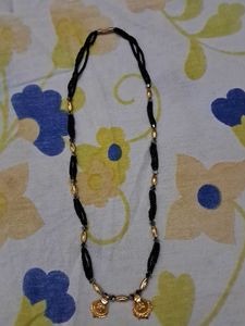 Elegant Beaded Necklace with Gold Pendant