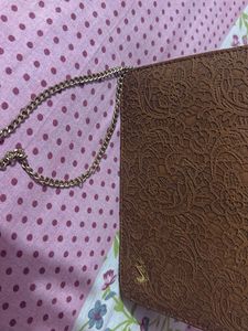 Elegant Embossed Clutch and sling bag