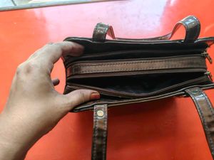 Chic Brown Patent Leather Handbag