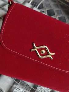Red Clutch with sling  Unique Clasp