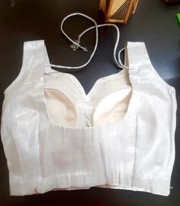 Beautiful silver shine sleeve less blouse 👚 side zip and margin also avilable 👍