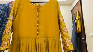 Elegant Yellow Embellished Ethnic Gown