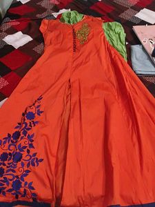 Orange Ethnic Gown with Blue Floral Embroidery