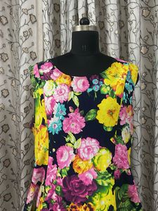 Vibrant Floral Sleeveless Peplum Top