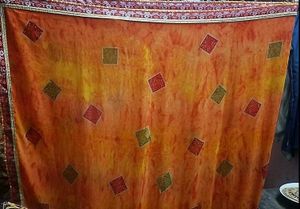 Vibrant Orange Saree with Geometric Print
