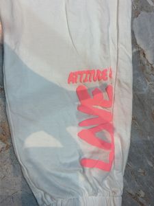Cream Jogger Pants with 'Love' Graphic
