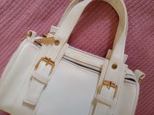 Chic White Shoulder Bag with Gold Accents