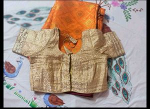 Orange Silk Saree with Golden Border