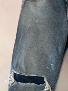 Distressed Blue Denim Jeans