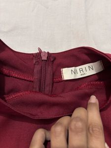 maroon high-neck flowy top