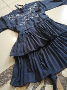 Embroidered Peplum Top