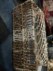 Woven basket on a metal frame
